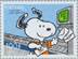A postage stamp with cartoon characters

Description automatically generated